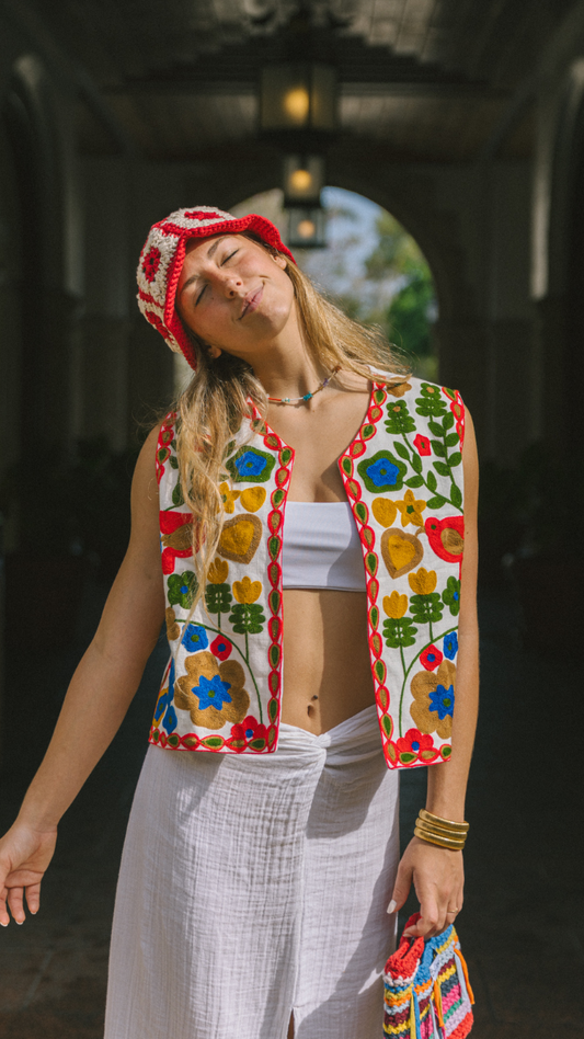 Vest with happy embroidery pattern