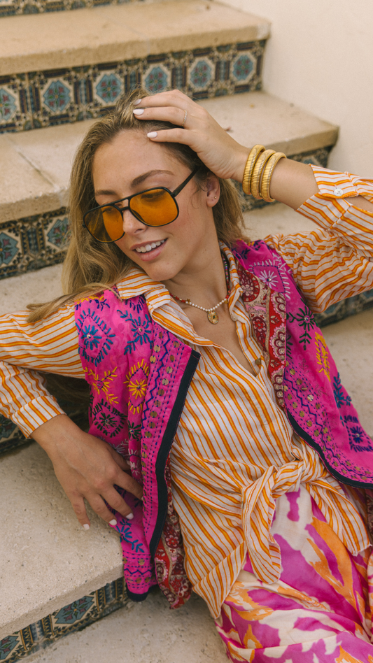 White blouse with orange stripes